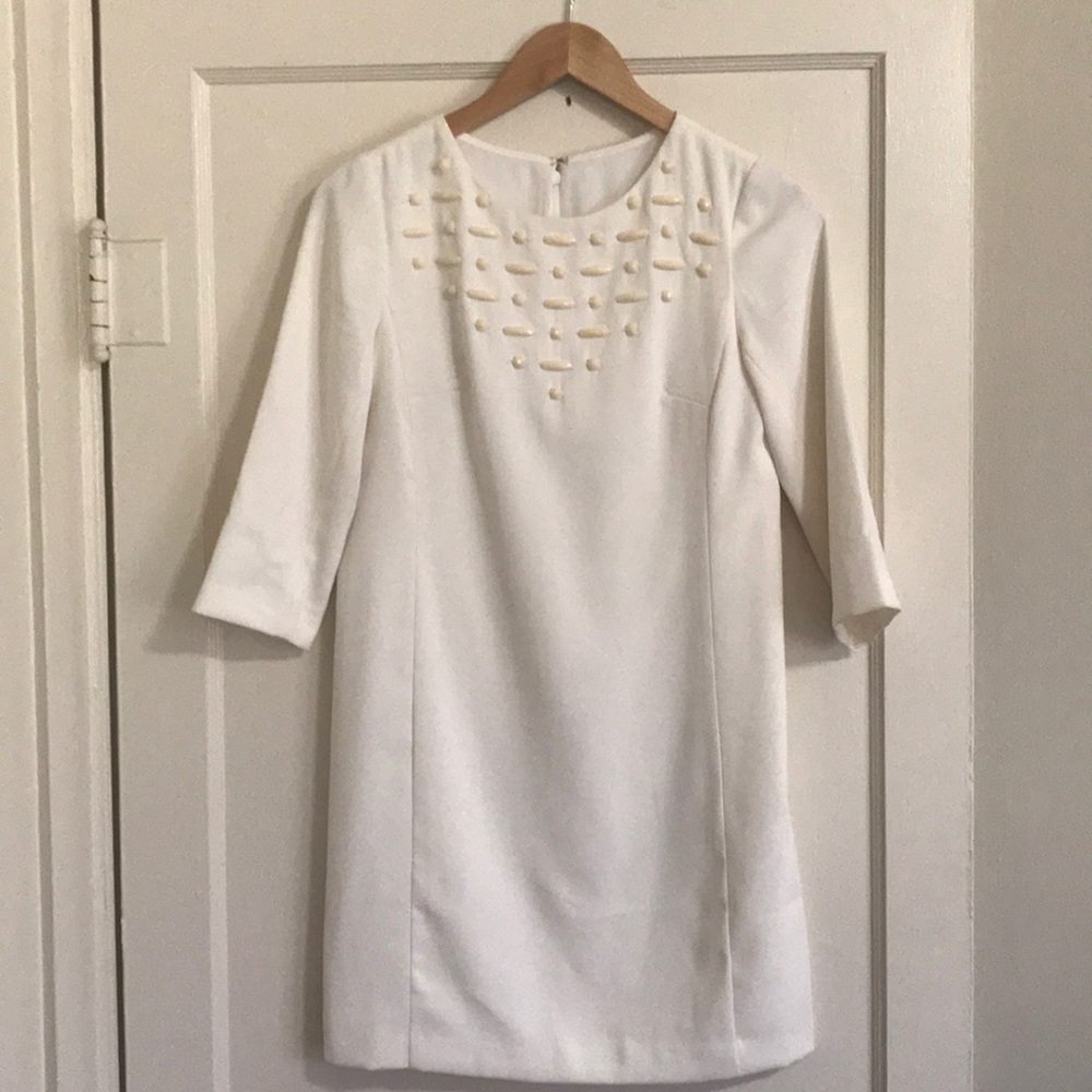 Cute ivory dress w/ white beading detail on front